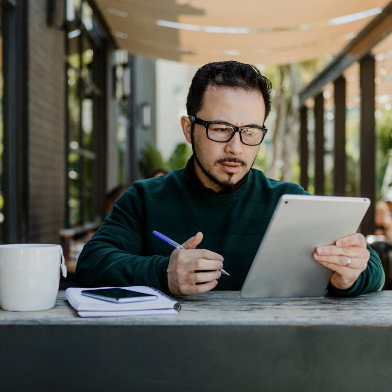 man-working-using-digital-tablet-2022-12-16-00-20-39-utc.jpg